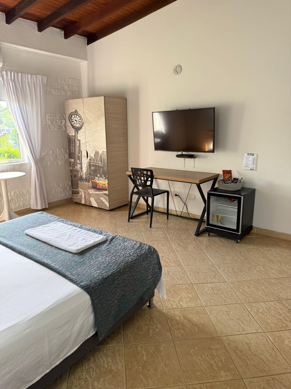 HOSTERIA HORIZONTES CAUCASIA - HABITACIÓN DELUXE UNA CAMA